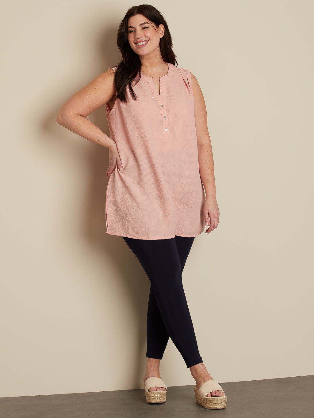 Sleeveless flared tunic