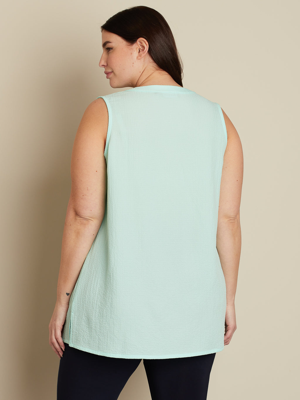 Sleeveless flared tunic