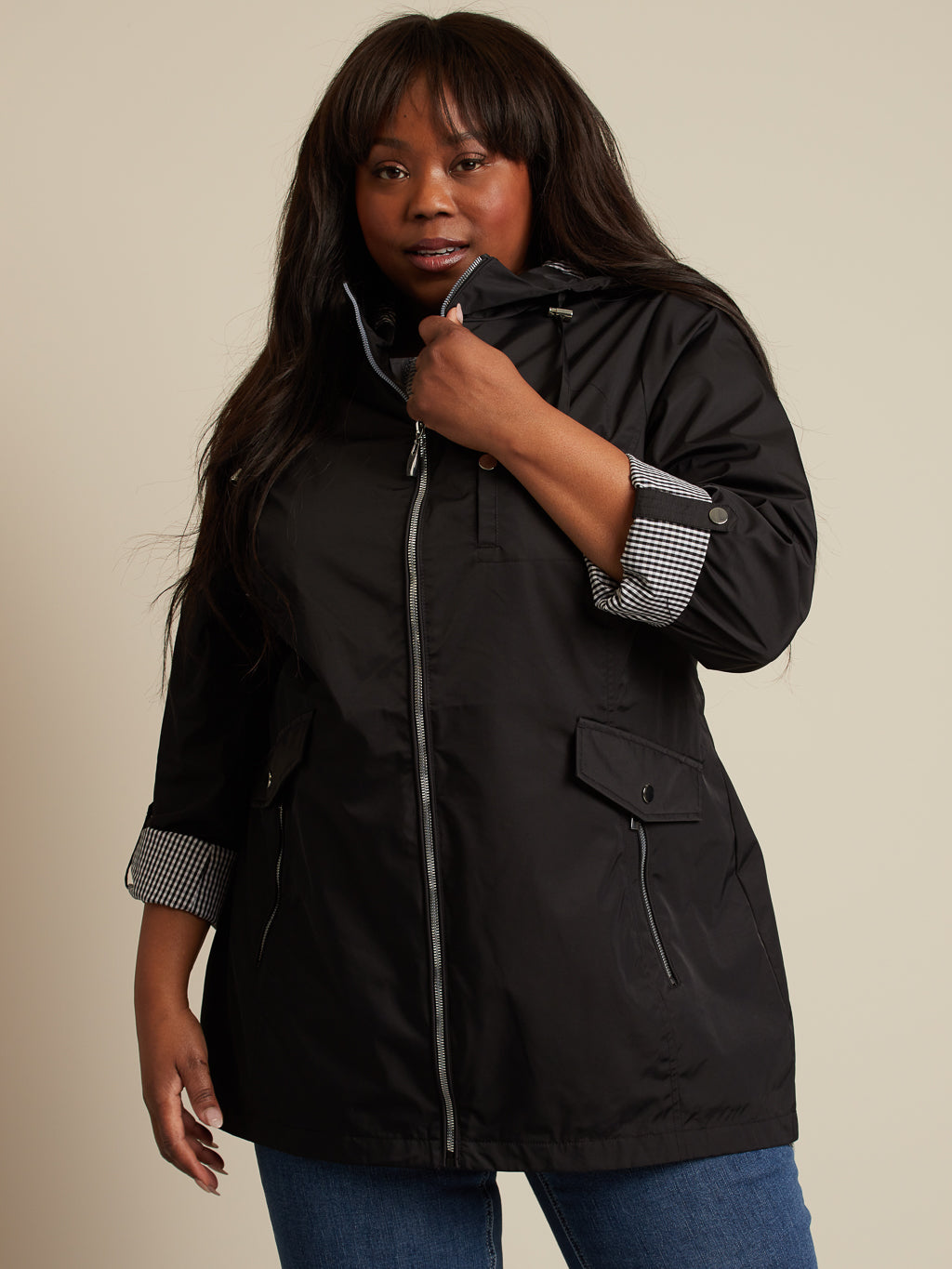 Hooded raincoat with contrasting details