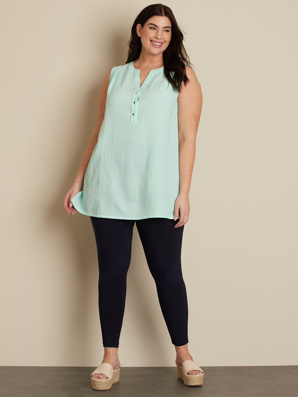 Sleeveless flared tunic