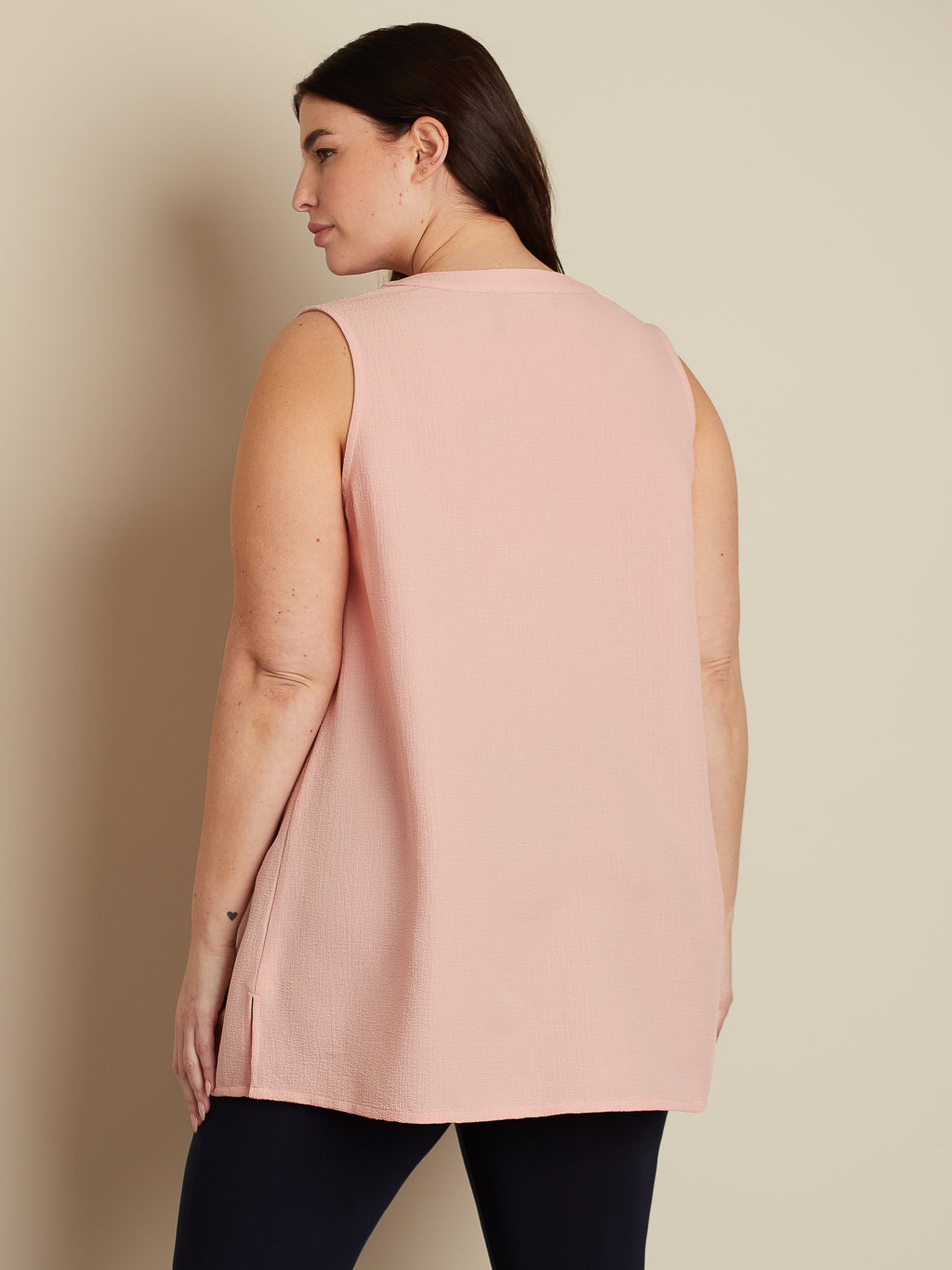Sleeveless flared tunic
