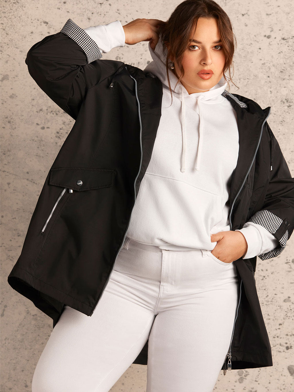 Hooded raincoat with contrasting details
